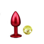 Analplug aus rotes Metall gelbe Diamant